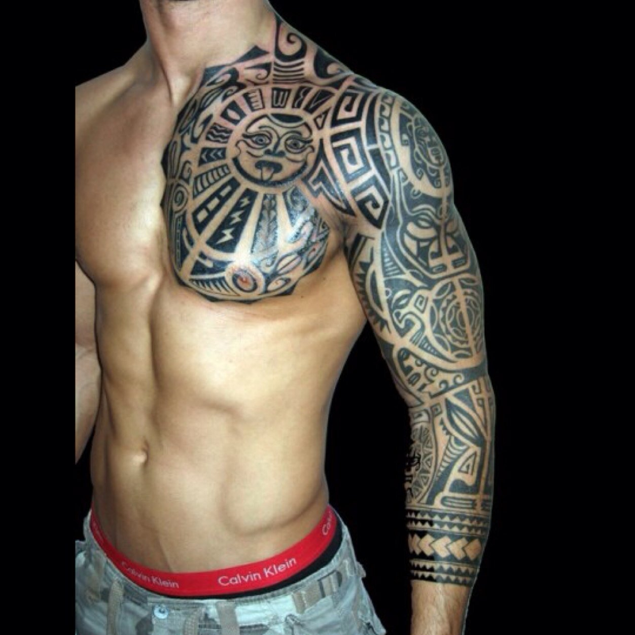 tribal tattoo half sleeve and chest