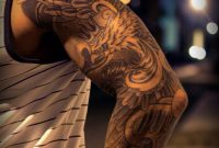 Amazing Realistic Black And Grey Phoenix With Crown Tattoo With Arm intended for sizing 820 X 1175