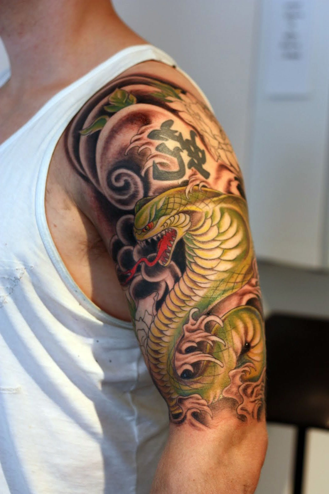half sleeve tattoo upper arm