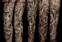 Beautiful Grey Ink Dragon Sleeve Tattoo throughout sizing 916 X 960