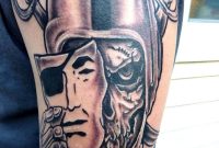 Big Oakland Raiders Skull With Mask Tattoo On Left Half Sleeve for dimensions 1200 X 1600