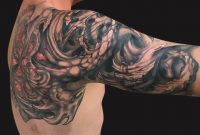 Bio Mechanical Shells Tattoo On Man Right Half Sleeve in dimensions 2967 X 2388