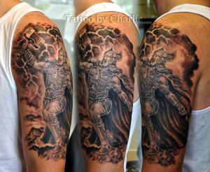 Black And Grey Thor Tattoo On Man Left Half Sleeve Charlie regarding proportions 3156 X 2592