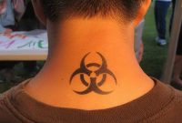 Black Biohazard Tattoo On Man Back Neck with regard to dimensions 1048 X 786