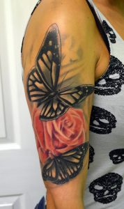 Black Butterflies With Red Rose Tattoo On Half Sleeve for dimensions 688 X 1162