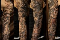 Black Ink Dragon Tattoo On Man Left Full Sleeve with proportions 1600 X 1642