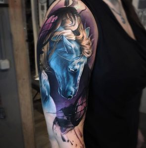 Blue Horse Tattoo On Girls Upper Arm Best Tattoo Design Ideas throughout sizing 1050 X 1068