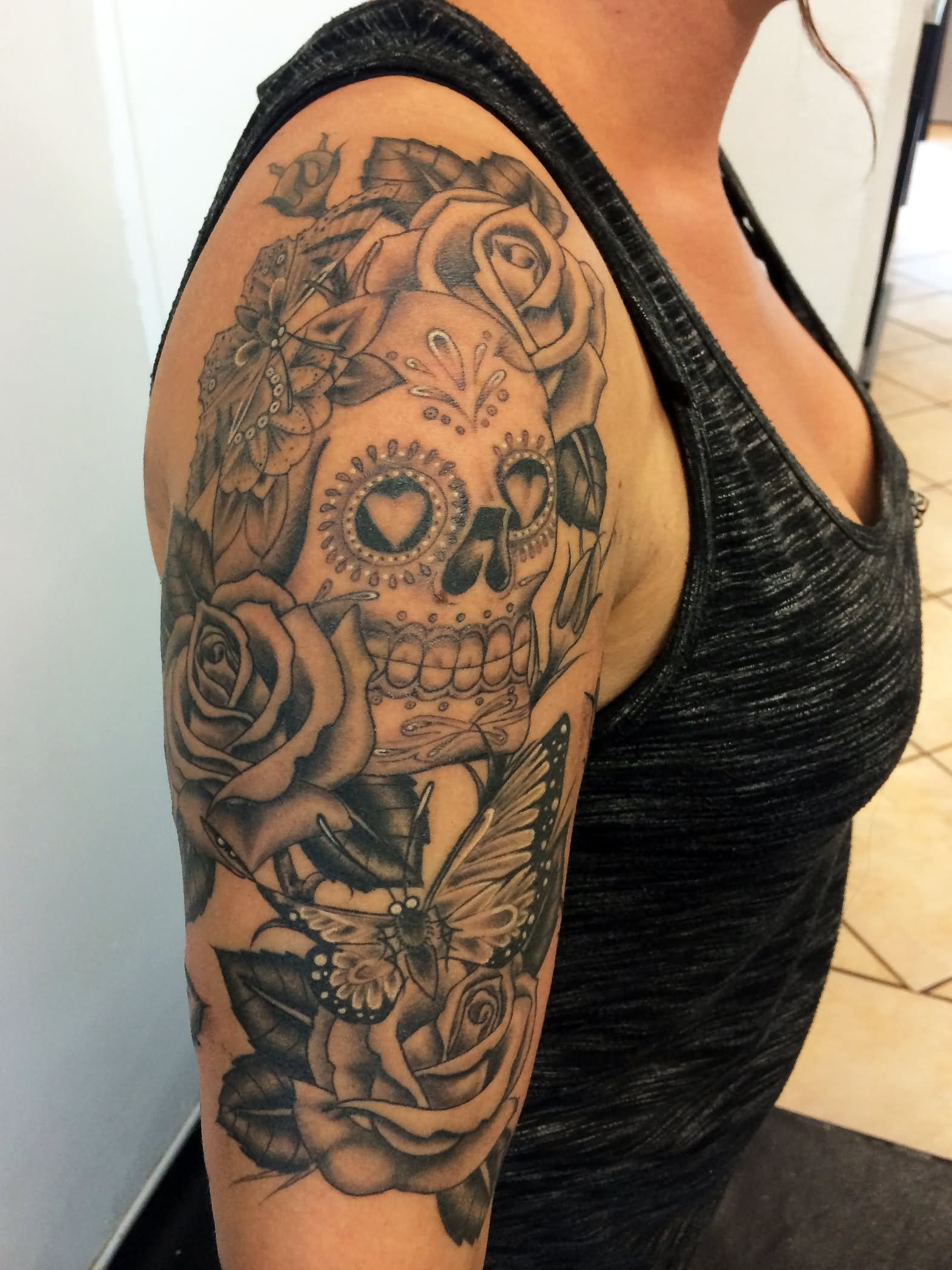 Dia De Los Muertos Skull With Roses And Butterfly Tattoo On Right with regard to measurements 1572 X 2096