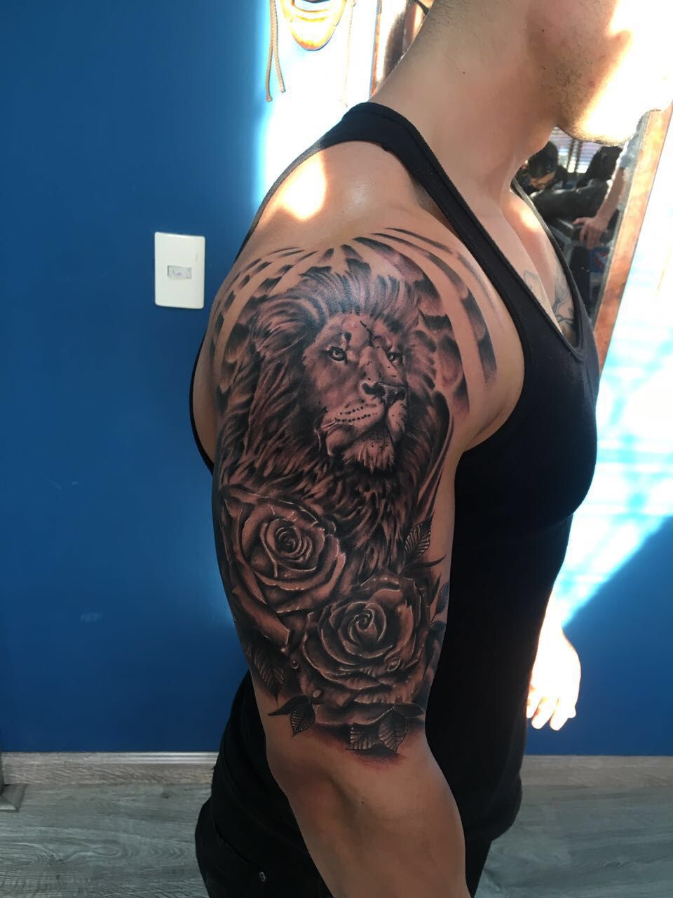 Realistic Lion Tattoo On Right Half Sleeve