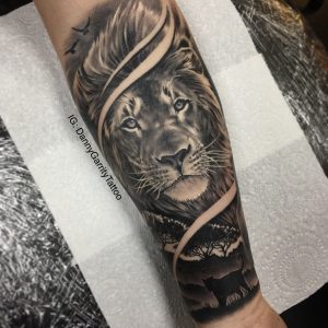 Mens Forearm Sleeve Tattoo Lion With Silhouette In Realism intended for size 1818 X 1818