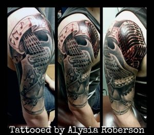 Mic With Awesome Piano Keys And Guitar Tattoo On Half Sleeve for size 960 X 844