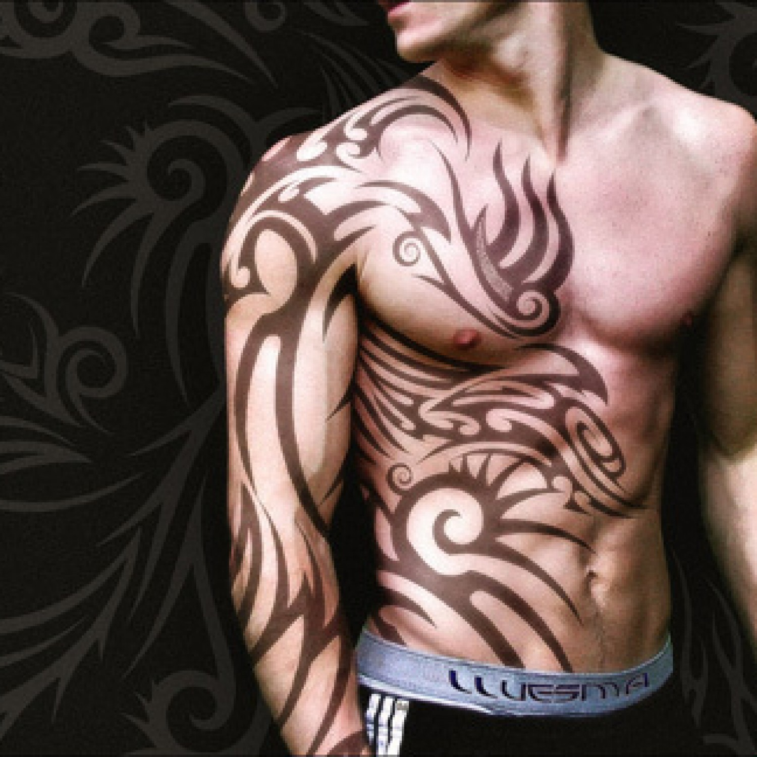 tribal tattoo sleeve and chest