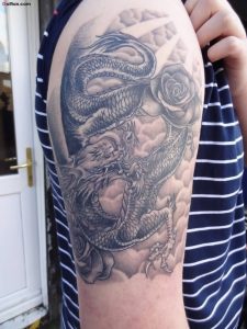 Traditional Old Angry Crawling Asian Dragon Tattoo On Upper Sleeve within sizing 800 X 1067