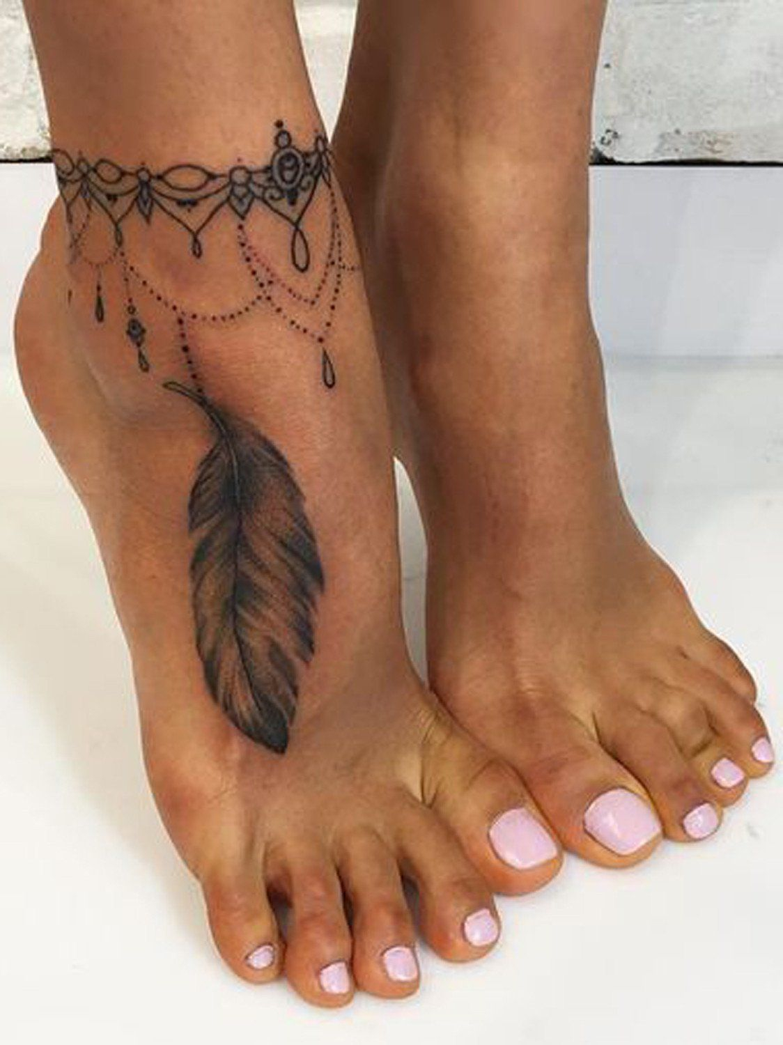 20 Feather Tattoo Ideas For Women A Tattoo Anklet Tattoos Foot in measurements 1124 X 1500