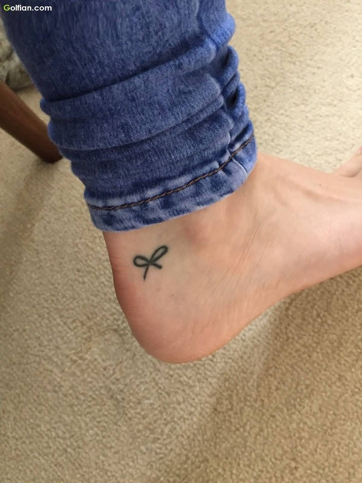 Awesome Black Minimal Bow Tattoo On Ankle We Can Tell You Firsthand pertaining to measurements 1200 X 1600