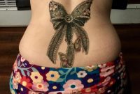 Beautiful Lace Bow Lower Back Tattoo Lowerbacktattoos Tattoos with regard to proportions 1080 X 1080