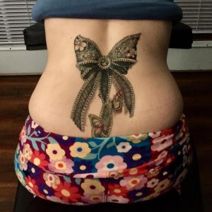 Beautiful Lace Bow Lower Back Tattoo Lowerbacktattoos Tattoos with regard to proportions 1080 X 1080