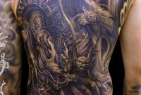 Black Ink Asian Warrior Tattoo On Man Full Back in dimensions 815 X 1126