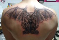 Black Ink Gargoyle Tattoo On Man Upper Back inside size 1024 X 768