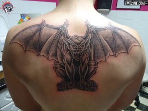 Black Ink Gargoyle Tattoo On Man Upper Back inside size 1024 X 768