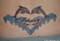 Dolphin Love Tattoo On Lower Back Tattoos Dolphins Tattoo Back pertaining to measurements 1024 X 768