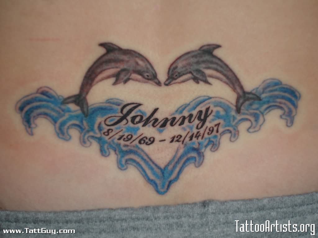 Dolphin Love Tattoo On Lower Back Tattoos Dolphins Tattoo Back pertaining to measurements 1024 X 768