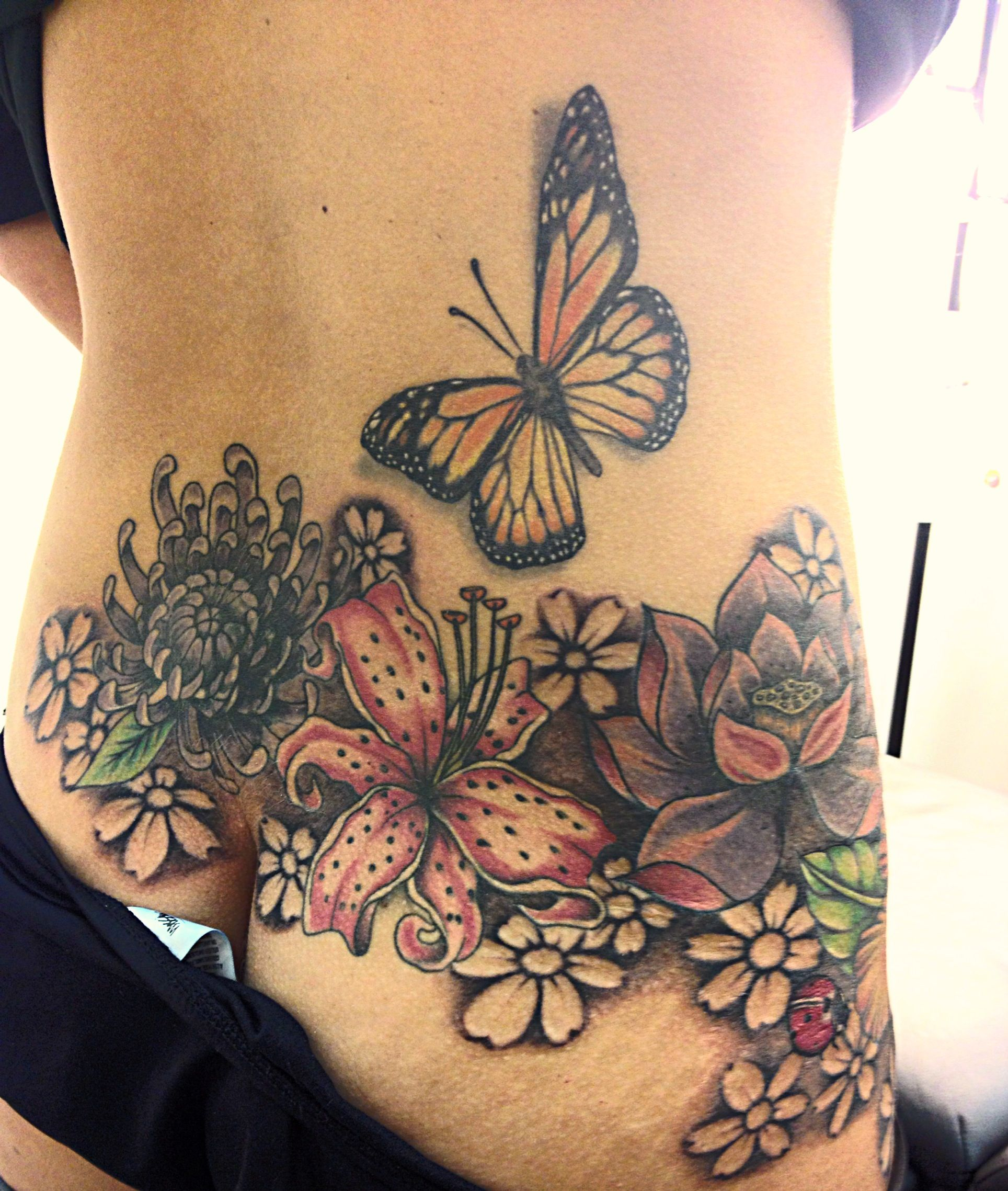 Lower Back And Hip Tattoo Not So Tramp Stamp Back Hip Tattoos in dimensions 1928 X 2277