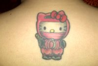 Ninja Hello Kitty Tattoo On Man Upper Back regarding measurements 1600 X 1200