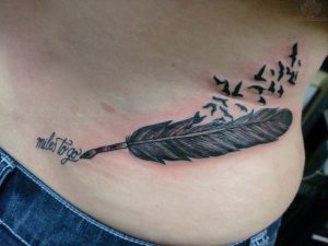 Raven Feather Tattoo On Lowerback pertaining to proportions 1280 X 960