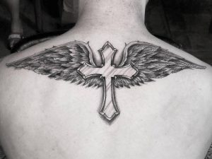 25 Cross Back Tattoos Of All Sizes Tattoozza with regard to measurements 1080 X 810