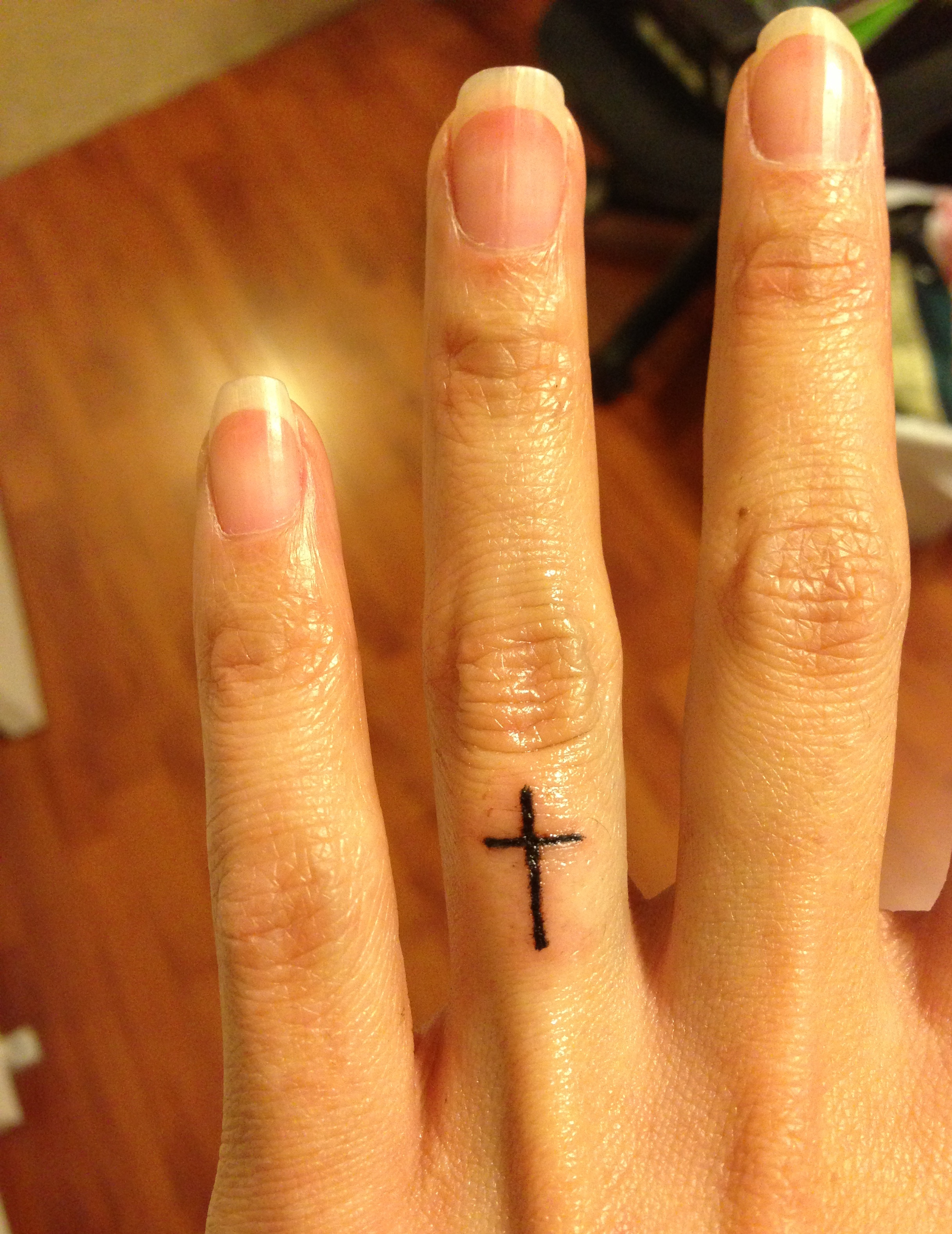 49 Elegant Cross Tattoos On Finger with regard to proportions 2435 X 3155