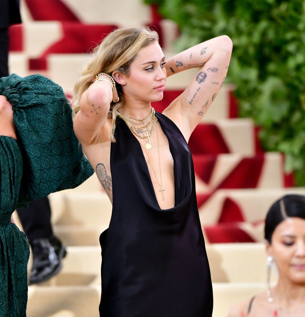 A Complete Guide To Almost All Of Miley Cyrus Tattoos Miley inside sizing 987 X 1024