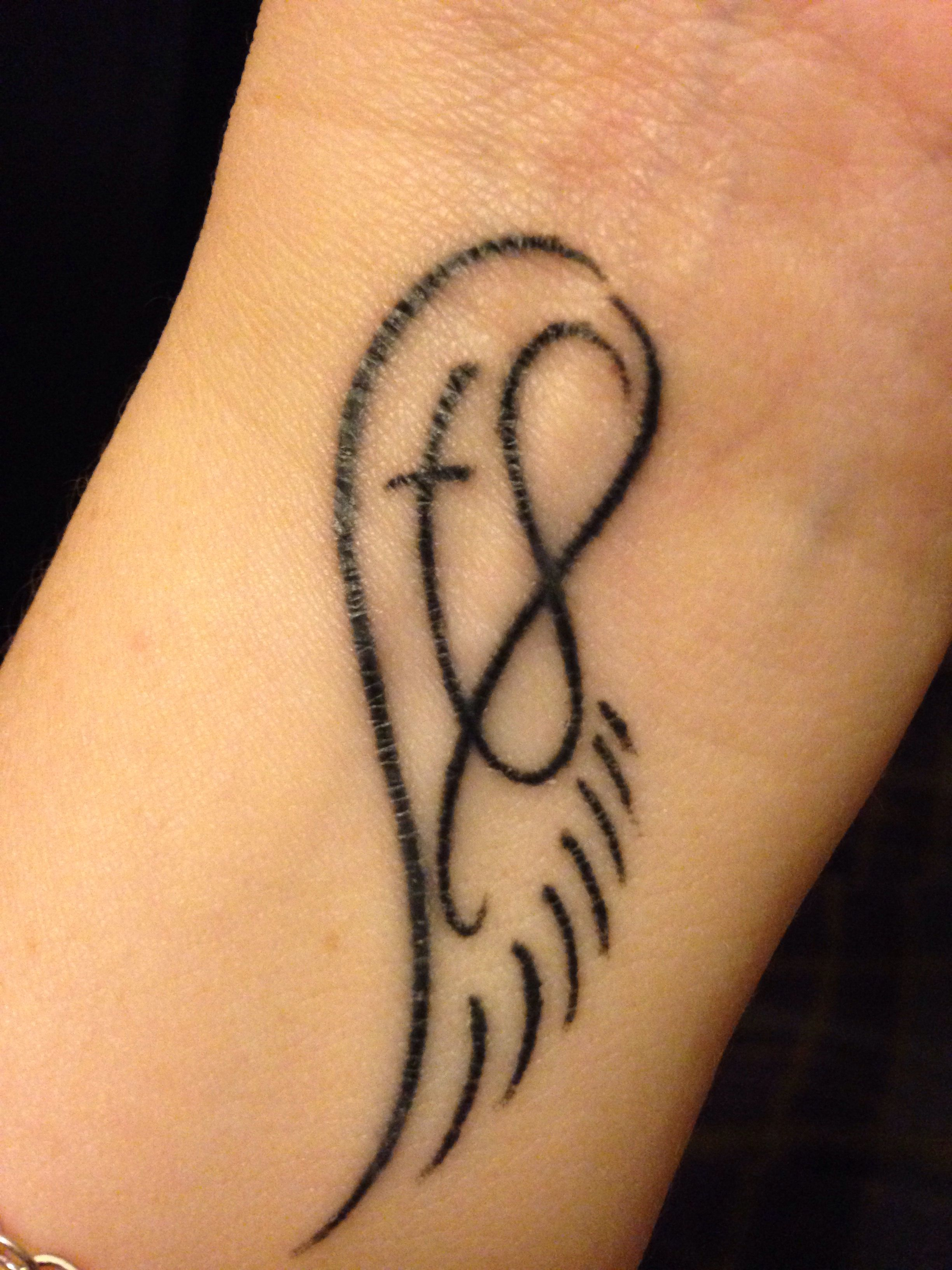 Angel Wings With Cross And Infinity Symbol Love Tattoos in sizing 2448 X 3264