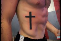 Black Simple Cross On Ribs Tattoo Jenny Forth Miami Tattoos throughout proportions 2389 X 2381