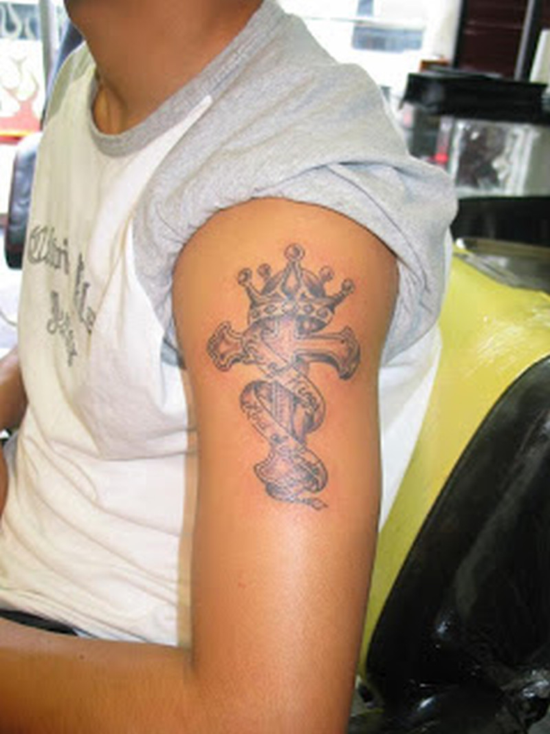 Cross Crown Tattoo On Biceps For Guys Tattoos Book 65000 within proportions 800 X 1067