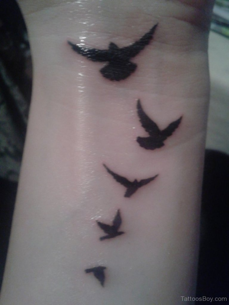 Flying Birds Tattoo On Wrist Tattoo Designs Tattoo Pictures within size 768 X 1024