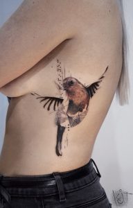 Koit Tattoo Berlin Red Brown And Black Ron Bird Rib Tattoo within measurements 1226 X 1920