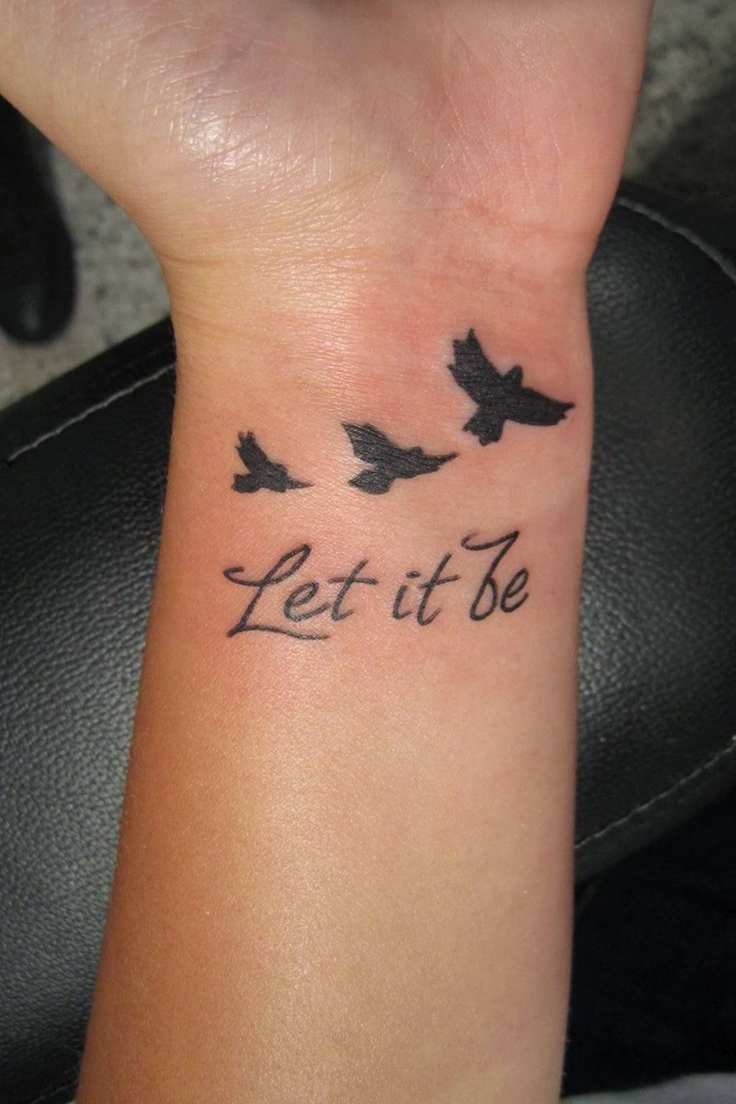 Let It Be Writing And Flying Birds Tattoo On Wrist Tattoo Mania inside dimensions 1067 X 1600