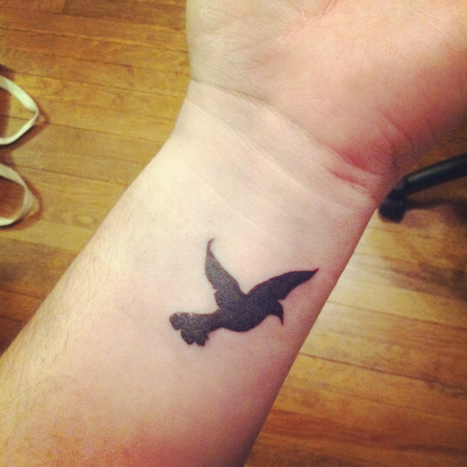 Little Black Bird Tattoo On Wrist within size 1600 X 1600