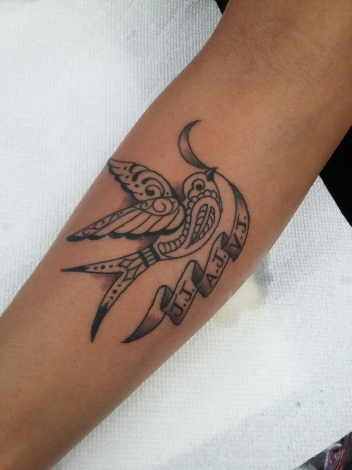 Mendi Sparrow Bird Tattoo With Names Of Her Kids In The Ribbons for sizing 1224 X 1632