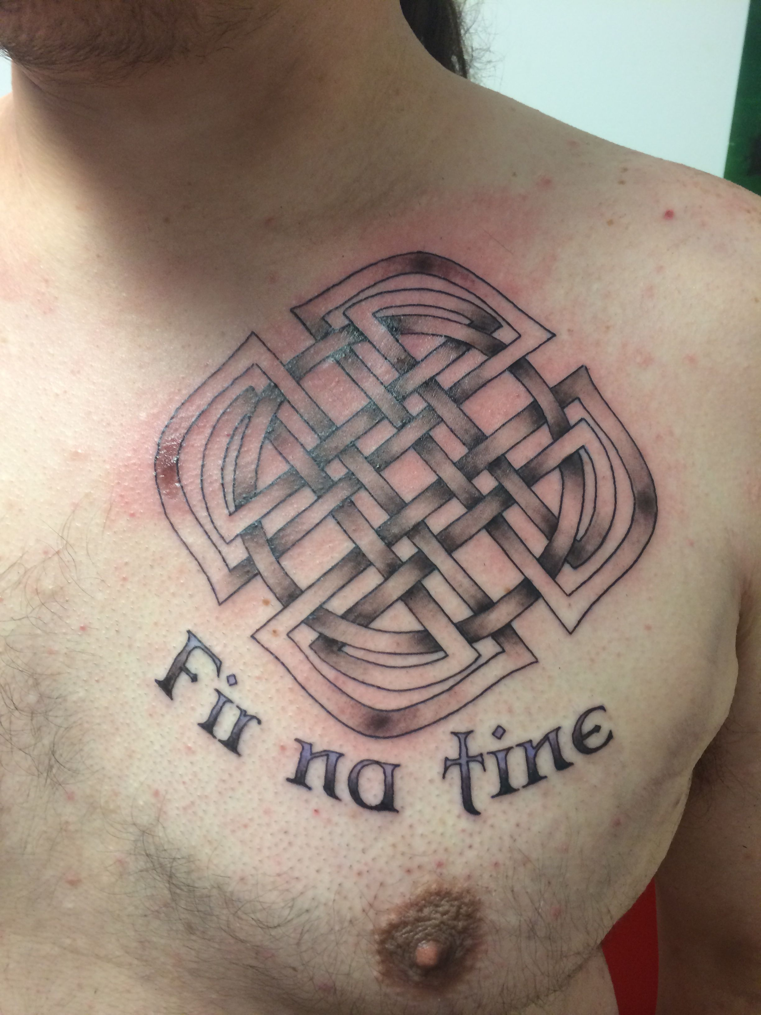 My First Tattoo Celtic Maltese Cross With The Words Fir Na Tine for sizing 2448 X 3264