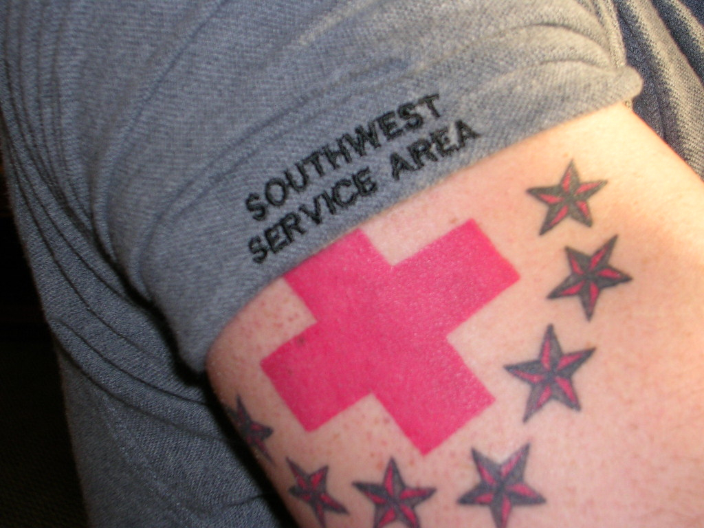 Red Cross Tattoo Red Cross Employee Eric Jones Arm American with proportions 1024 X 768