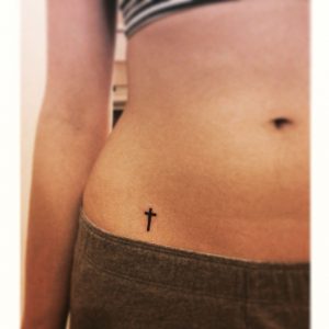 Small Christian Tattoo Of Cross On Hip For Woman Tattoo with measurements 1136 X 1136