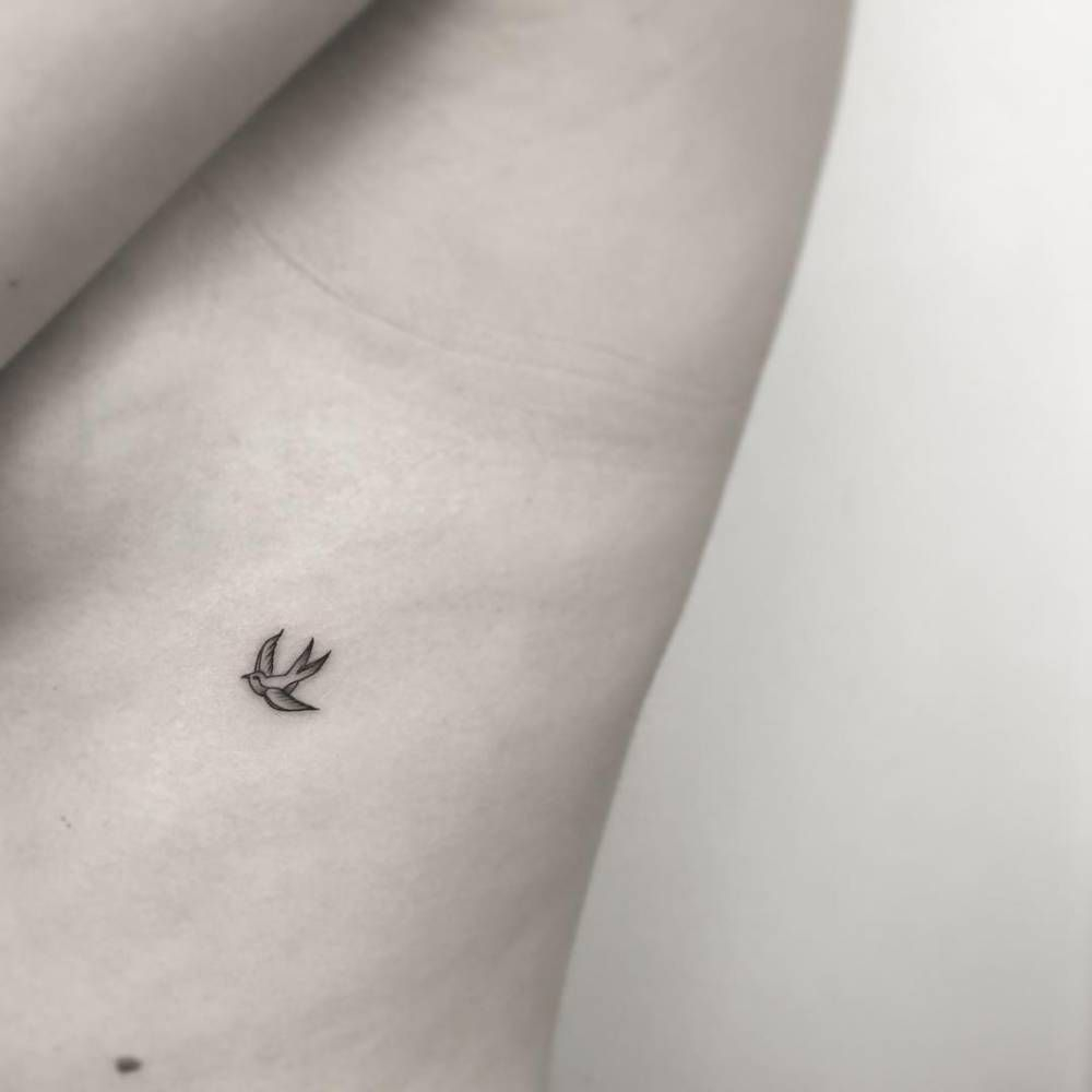 Tiny Swallow Tattoo On The Left Side Ribcage Done At West 4 Tattoo intended for dimensions 1000 X 1000