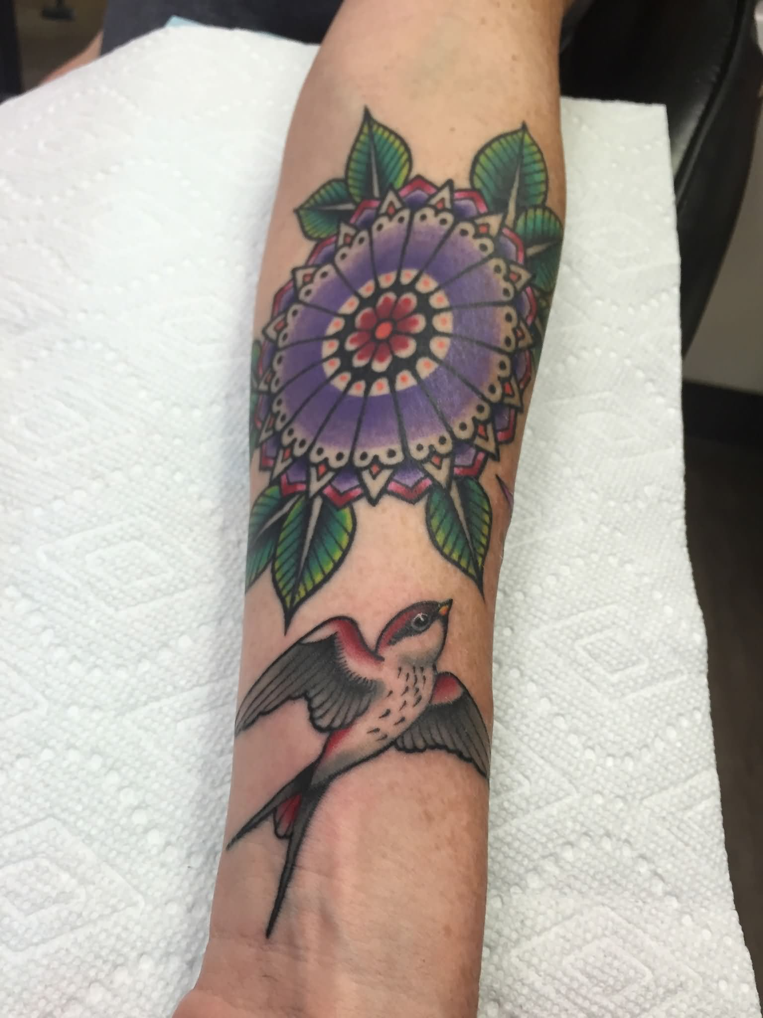 Traditional Colorful Flower With Flying Bird Tattoo On Left Forearm throughout proportions 1536 X 2048