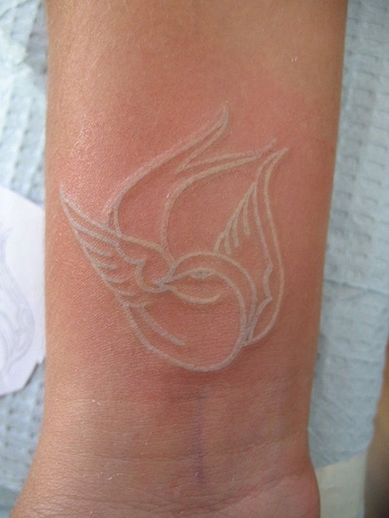 White Ink Little Bird Tattoo On Wrist Tattoos Book 65000 in proportions 800 X 1067