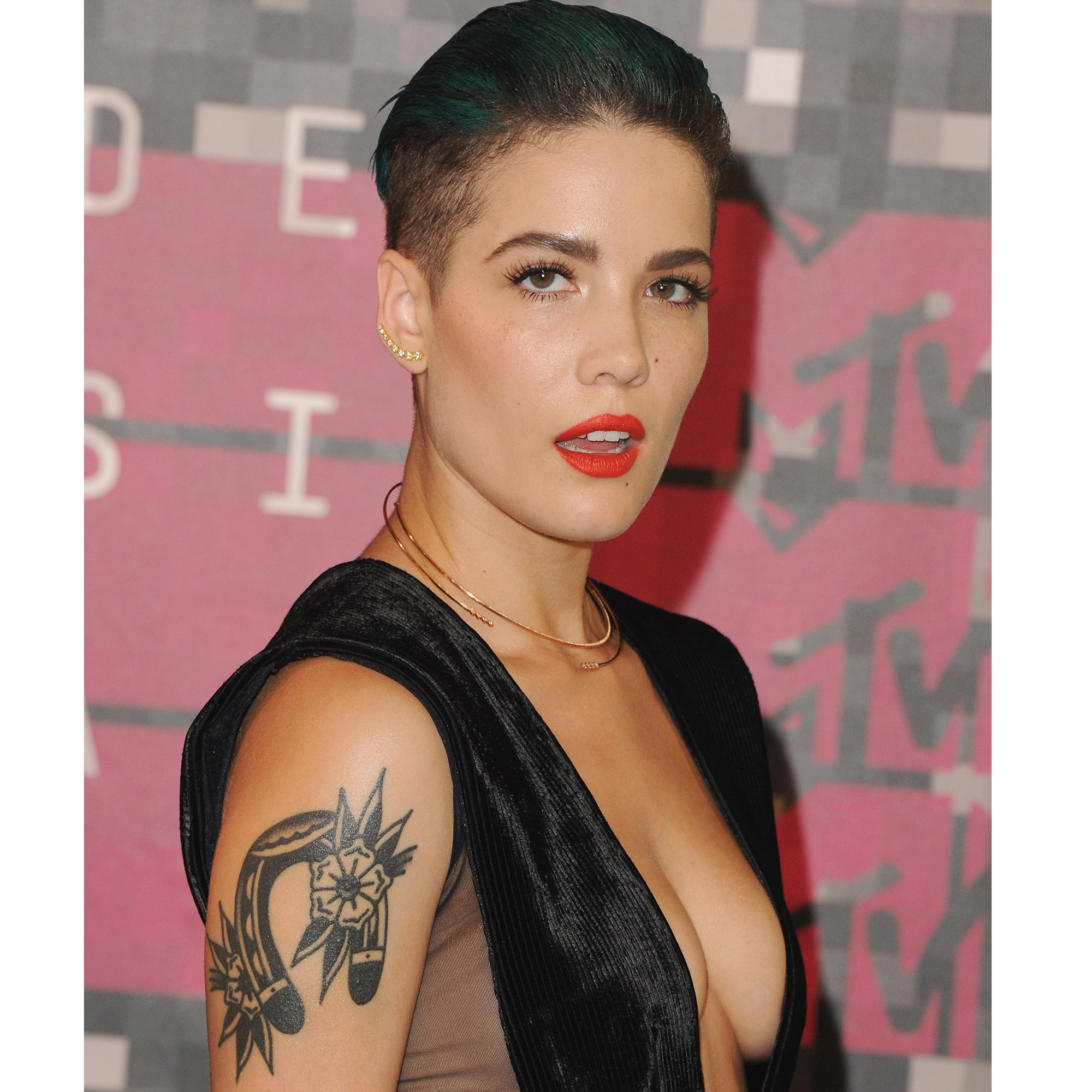 56 Celebrity Tattoo Photos Best Celebrity Tattoos Of 2018 Allure for size 2000 X 2000