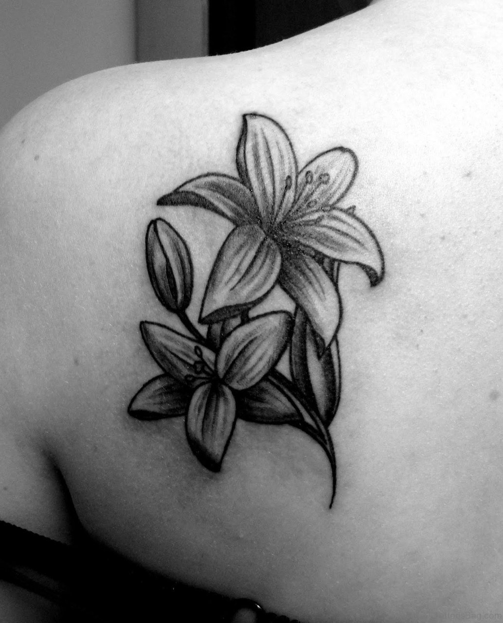 59 Graceful Lily Tattoos For Shoulder in proportions 1034 X 1280