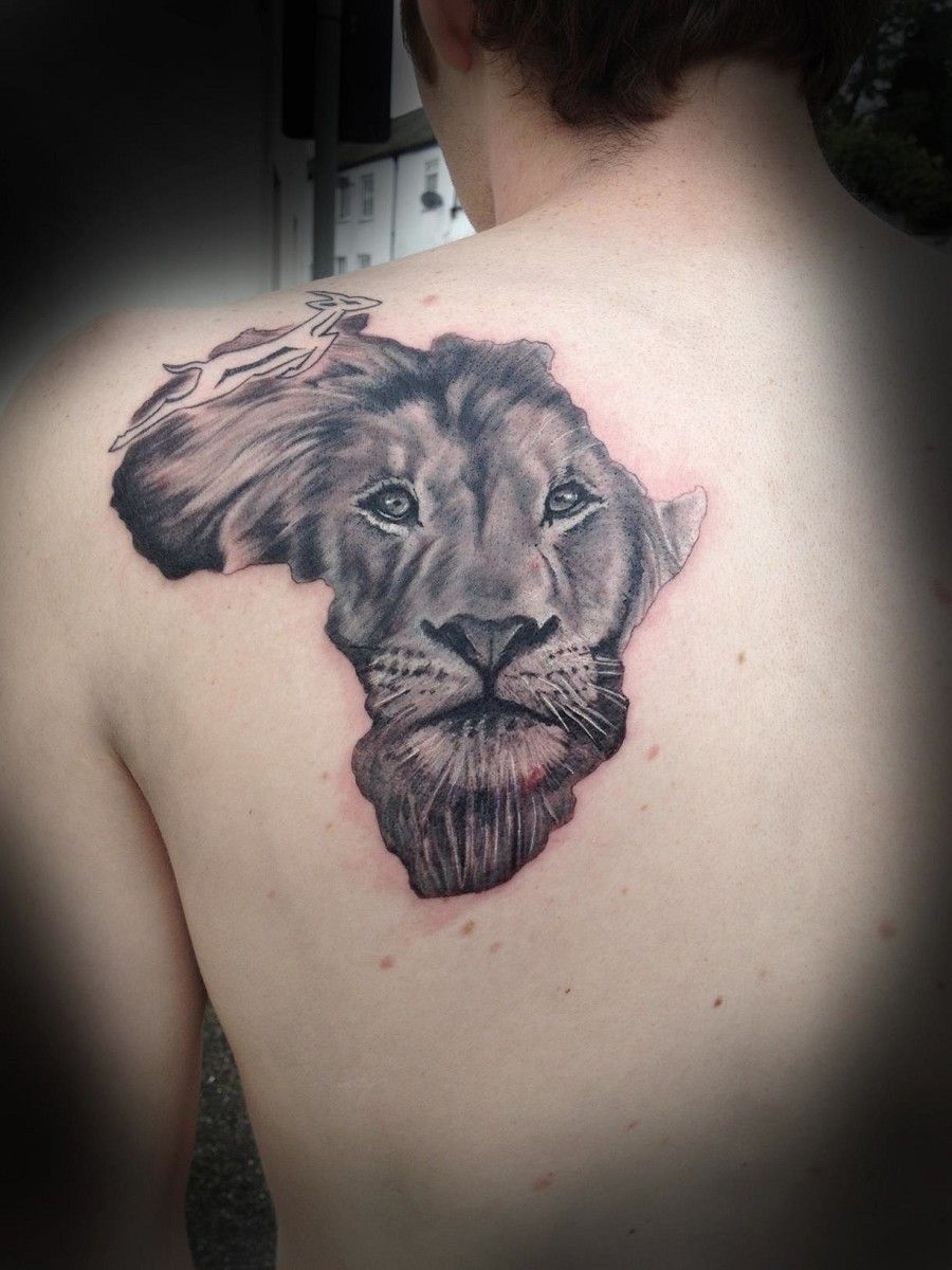 African Lion Face Tattoo On Man Back Swagu African Tattoo within size 900 X 1200