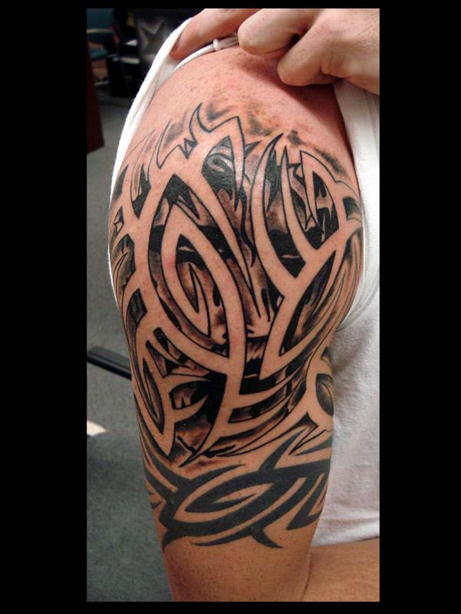 Amazing Half Sleeve Tribal Tattoo Design For Men Tribal Tattoos for proportions 900 X 1200